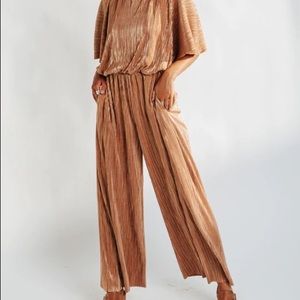 The Dimitri Shimmer Jumpsuit in Rose Gold